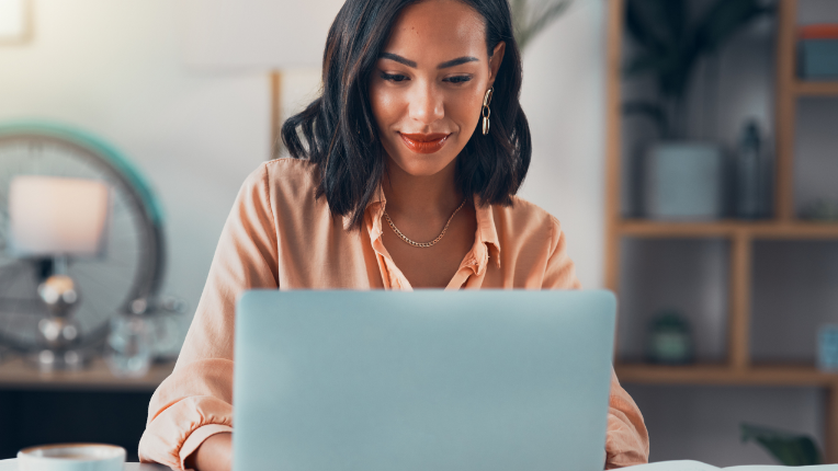 Woman viewing her laptop.